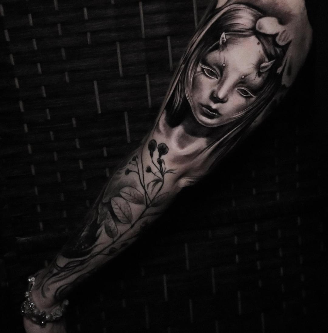 Tattoo girl sleeve in style gothic